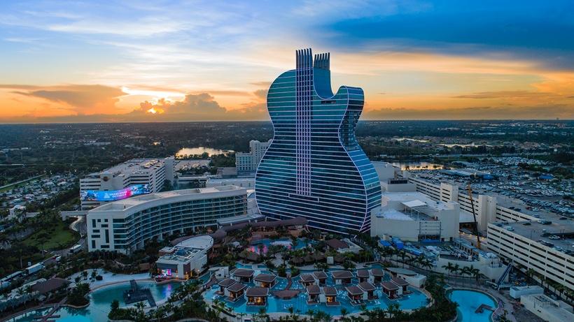 world-s-first-guitar-shaped-hotel-comes-to-life-with-dramatic-visuals