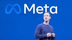 Mark Zuckerberg in front of Meta graphic