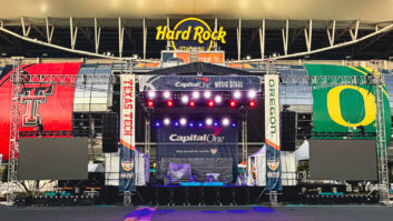 DAS Audio at the Orange Bowl front view of the stage with Hard Rock in the background above the stage.