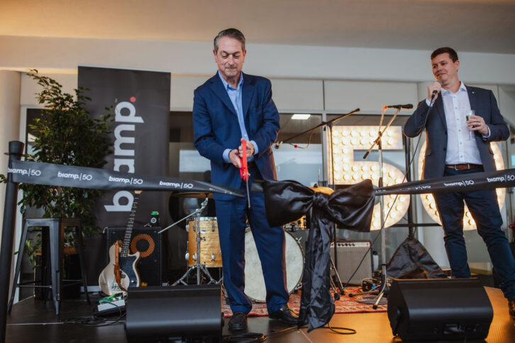 Biamp CEO Rashid Skaf officially cuts the ceremonial ribbon welcoming guests the Biamp Brisbane Experience Centre in Australia